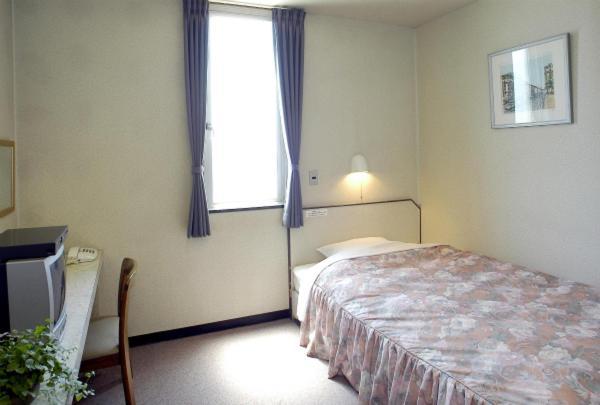 Business Hotel Prince Takamacu Pokoj fotografie